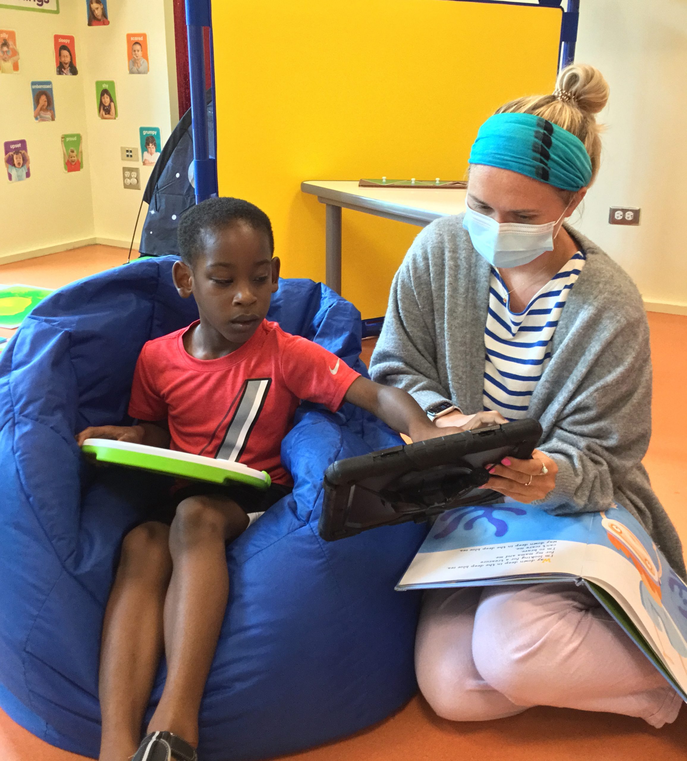 teacher and student in classroom session