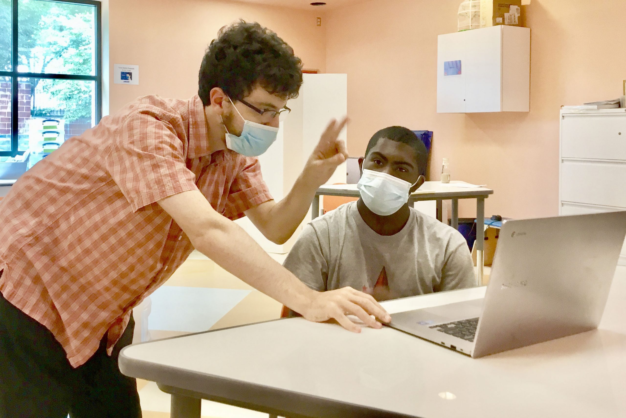 teacher and student in classroom session