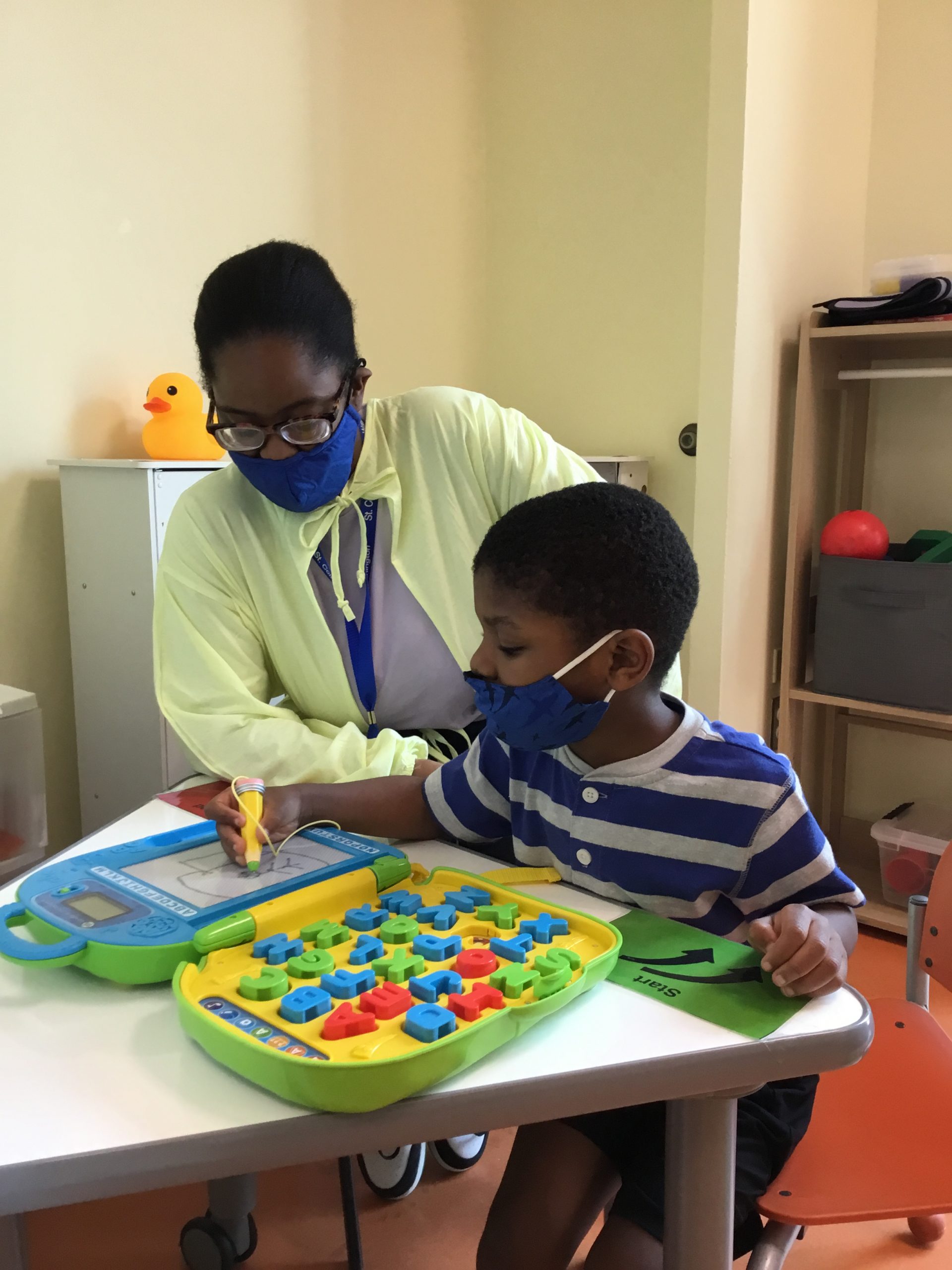 teacher and student in classroom session