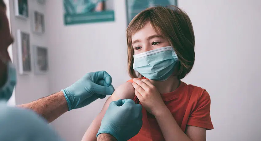 child getting vaccine