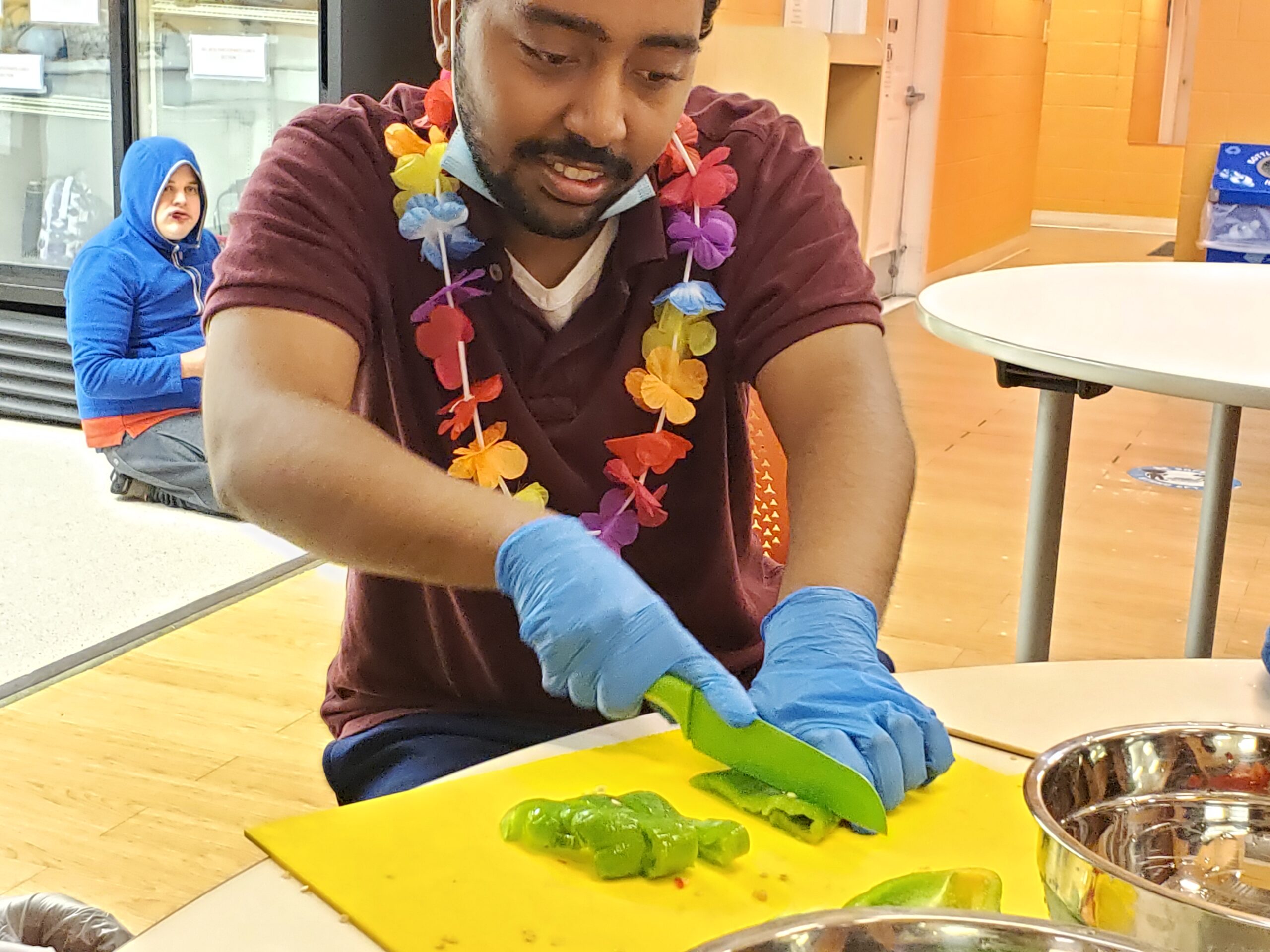 Adult program participant in a cooking lesson