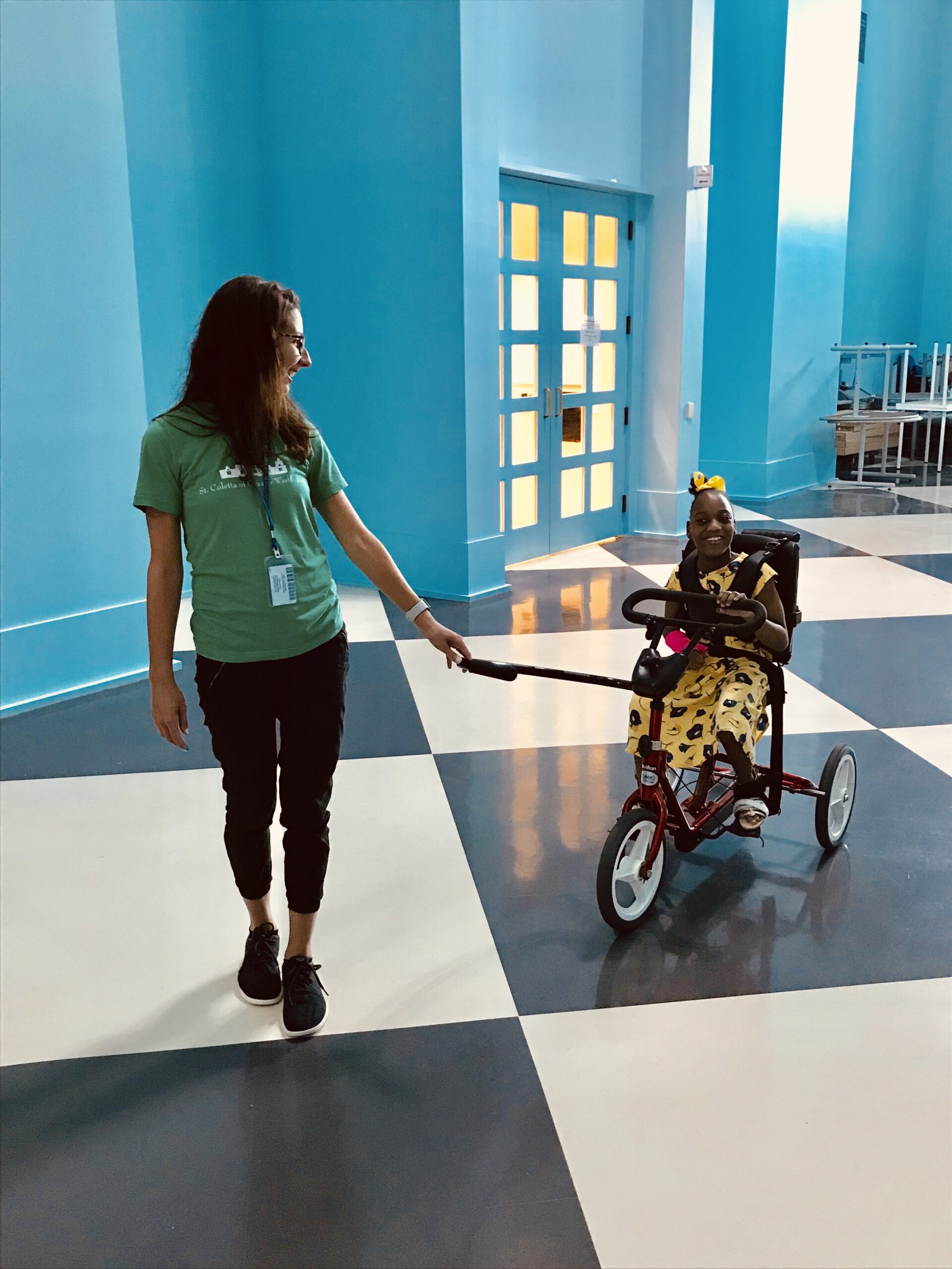 School Staff with student in the hallway