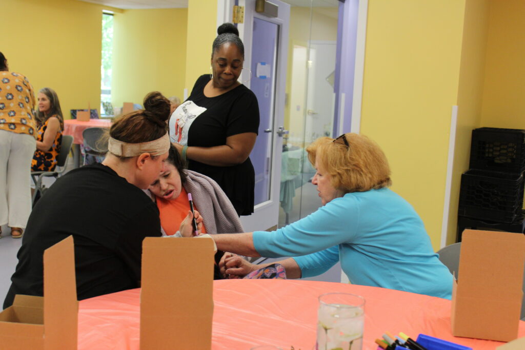 Family and participant at a tea party 
