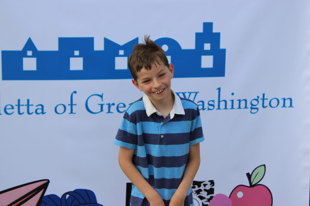 young student smiling at the camera