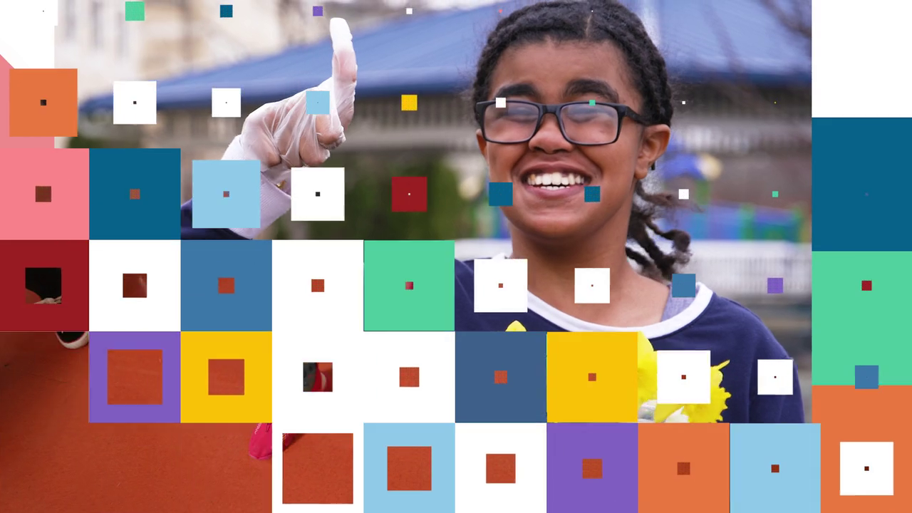 girl with glasses smiling